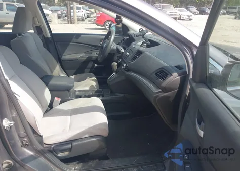 2015 Honda Cr-V Lx z USA, uszkodzony, nr VIN 2HKRM4H37FH617537